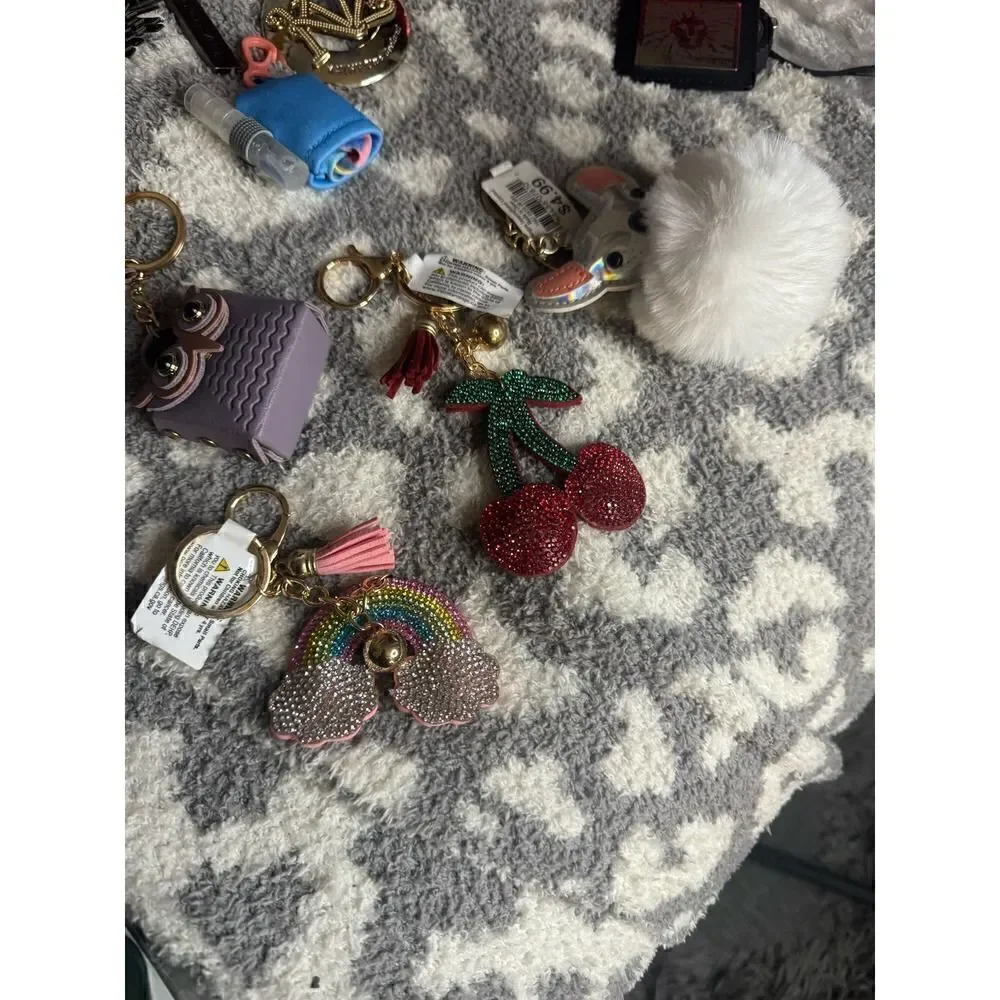 Lot of designer keychains,bag charms bling disney tassell